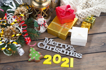 Merry Christmas, postcard with gifts and Christmas decorations.