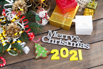 Merry Christmas, postcard with gifts and Christmas decorations.