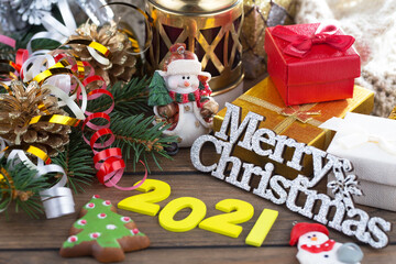 Merry Christmas and Happy New Year, postcard with gifts and Christmas decorations.