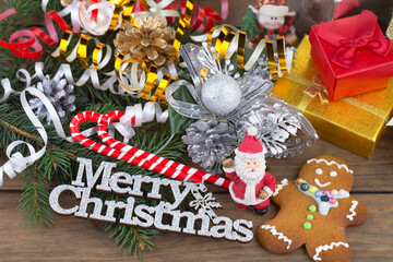 Merry Christmas and Happy New Year, postcard with gifts and Christmas decorations.
