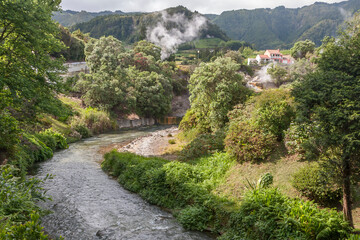 Fototapeta na wymiar landscape with a view of the village from volcanic sources, Furnas - Sao Miguel