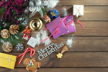 Merry Christmas and Happy New Year, postcard with gifts and Christmas decorations.