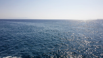 Blue sea background. Aqua sea water surface. Sea surface view.