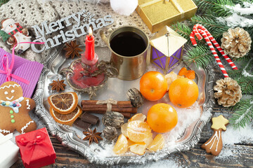 Merry Christmas, postcard with gifts and Christmas decorations.