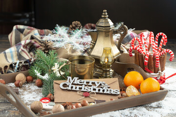 Merry Christmas card with gifts and coffee and Christmas decorations.
