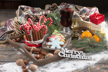 Merry Christmas card with gifts and, coffee and Christmas decorations.