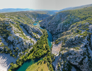 Zrmanja River in northern Dalmatia, Croatia is famous for its crystal clear waters and countless waterfalls surrounded by a deep canyon.