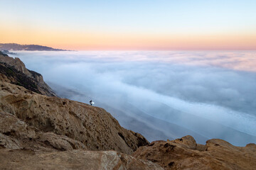 Surfer Above the Clouds in San Diego