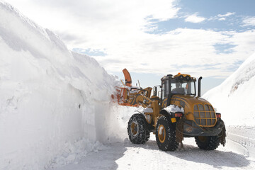 Snowplow working in the snow