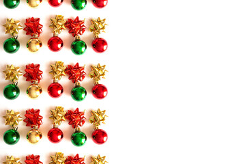 Christmas minimal pattern - colored xmas ball on white background. Flat lay, top view.