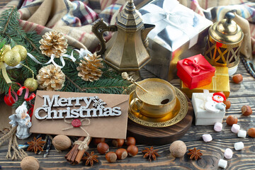 Merry Christmas card with gifts and coffee and Christmas decorations.