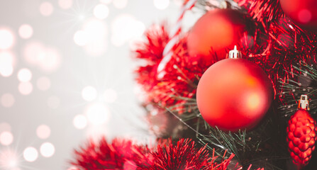 Merry Christmas holiday with red star on the tree, toy socks, Merry Christmas on the bokeh background happy New Year and Family happiness festival  background Beautiful decorations.