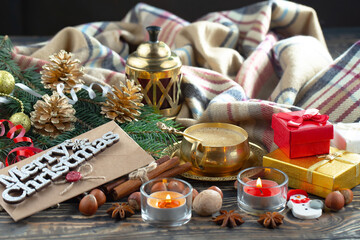 Merry Christmas card with gifts and, coffee and Christmas decorations.
