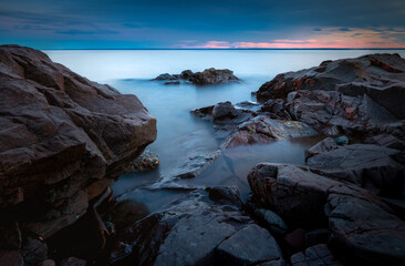 Rocks on beach long exposure