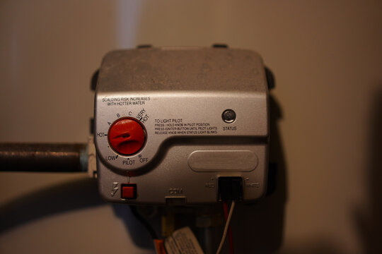 Boiler pilot light igniter and water temperature regulator