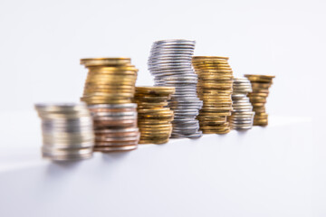 collection of colorful metal coins isolated on white background, close view 