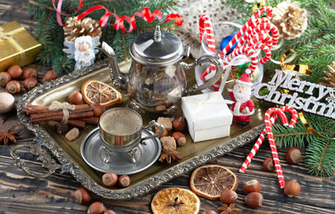 Merry Christmas card with gifts and coffee and Christmas decorations.