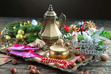 Merry Christmas, postcard with gifts and Christmas decorations.