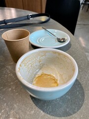 empty cup with coffee in a cafe