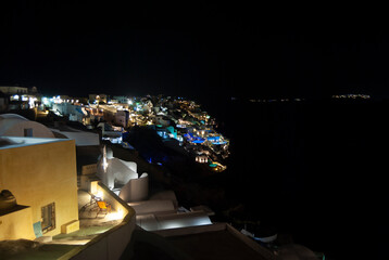 Illuminated houses in the beautiful night of the island of Santorini