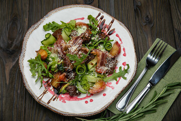 Salad with meat in an American bistro
