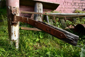 large rusty hinge from the gate
