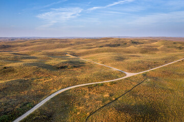 Fototapeta na wymiar landscape of Nebraska Sandhills, early morning aerial view at Nebraska National Forest with dirt sandy roads