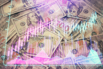 Multi exposure of forex chart drawing over us dollars bill background. Concept of financial success...