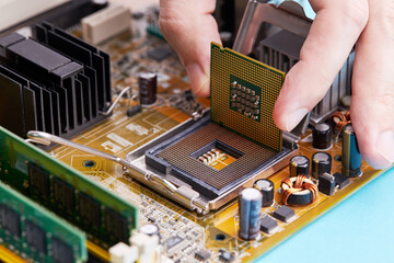 close up view for cpu or central processor chip over circuit board background. electronic industry conceptual. studio shot