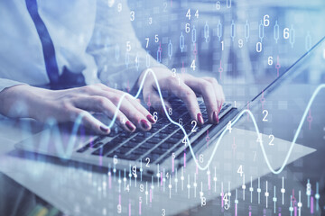 Multi exposure of woman hands typing on computer and financial graph hologram drawing. Stock market analysis concept.