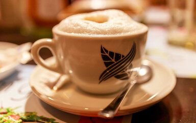 A cup of cappuccino in a cafe
