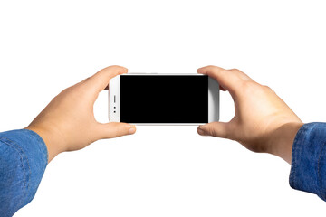 Male hands in jeans shirt holding a smartphone first person view.
