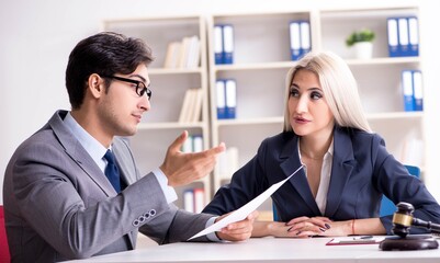 Lawyer discussing legal case with client