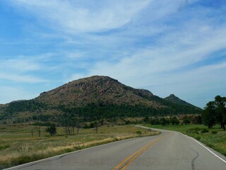 Medium wide shot of Mt Scott in the Wichita Mountains, Oklahoma.