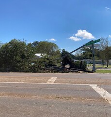 Knocked over street light and tree branches due to Hurricane Delta's storm damage in Lafayette...