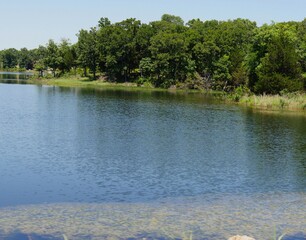 Close up of a lake seen from the road at Chickasaw National Recreation Area in Davis, Oklahoma