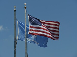 Close up of the flags of the United States of America and Oklahoma State