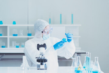 Scientist covid-19 virus chemistry  research experiment biotech antibody sample laboratory...