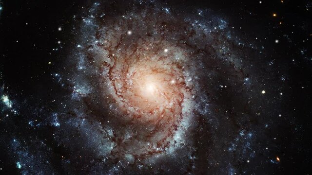 a spiral galaxy moving around in the universe