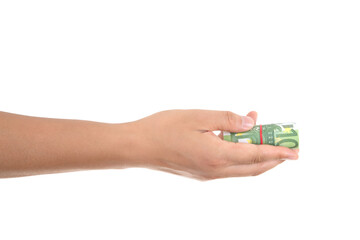 A hand holding a euro banknote in front of a white background makes a gesture of giving