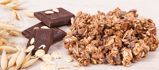 Granola, oat flakes and chocolate, healthy food for breakfast