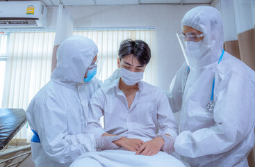 Doctor under checking and consultant for patient ,they wearing medical mask to protect from virus in hospital.