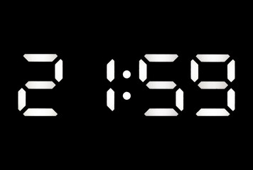Real white led digital clock on black background