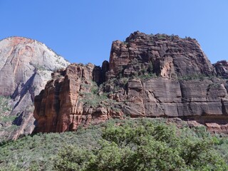 Fototapeta premium Breathtaking cliffs and rock formations lure millions of visitors to Zion National Park in Utah each year