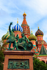 Fototapeta na wymiar Monument of Minin and Pozharsky at front of St. Basil cathedral on Red Square in Moscow, Russia