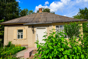 Small brick house in the ukrainian village
