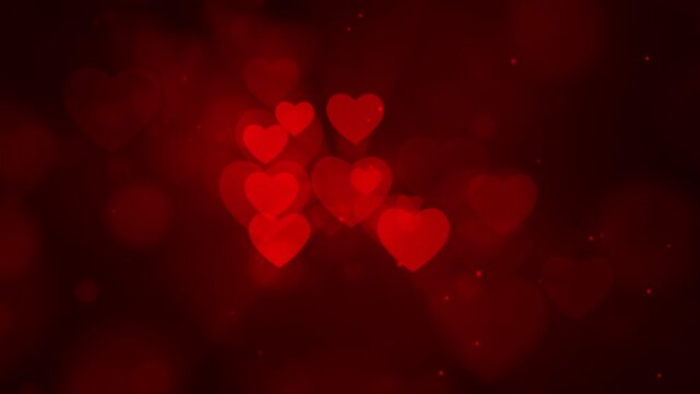 Abstract Red Hearts Particle Fade in bokeh floating on black screen background Loop Animation. Day 4K VFX love, mothers day, Marriage, Valentines day, Wedding Anniversary Love.