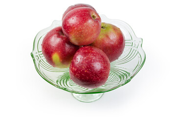 Washed red apples in the vintage glass vase for fruits