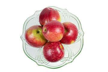 Top view of washed red apples in the glass fruit bowl
