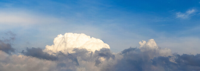White cloud in the dark dramatic sky, panorama of cloudy sky
